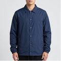Model wearing Lightweight Coach Jacket Lightweight Coach Jacket in studio
