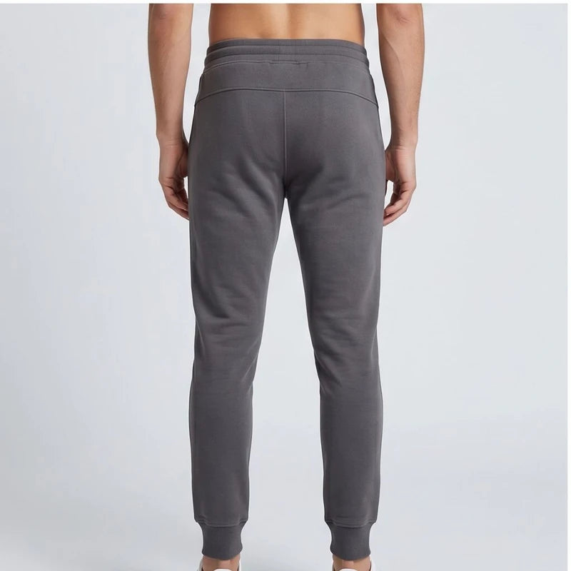 Model wearing Slim Jogger Pants Slim Jogger Pants in studio - 3
