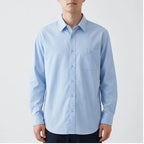 Model wearing Woven Button-Down Shirt Woven Button-Down Shirt in studio